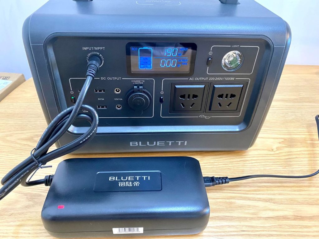 BLUETTI EB70S is charging with its cord